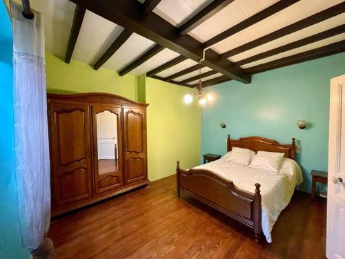 Llit o llits en una habitació de Maison bordenave