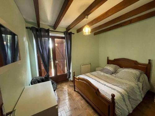 Llit o llits en una habitació de Maison bordenave