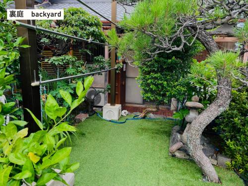 Jardín al aire libre en TAKIO 1 guesthouse