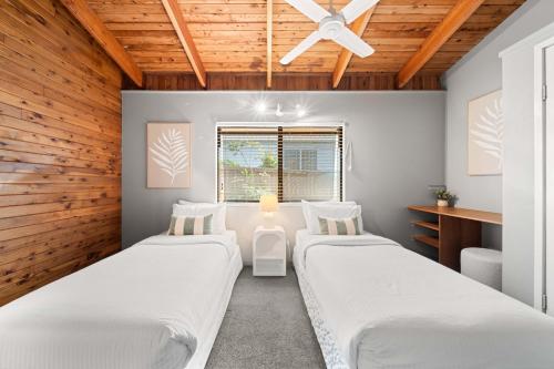 Buderim Rustic Retreat - Pool & Pet Friendlyにあるベッド