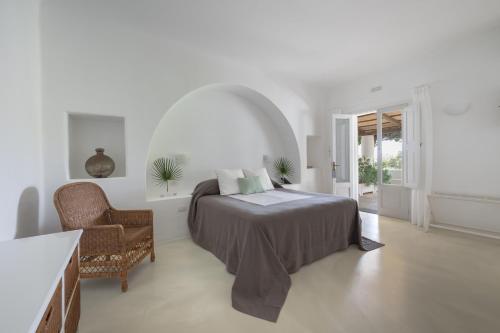 Postel nebo postele na pokoji v ubytování Capofaro Resort