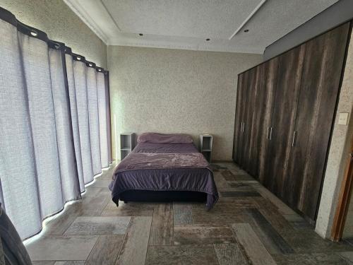 Katil atau katil-katil dalam bilik di Freeman Manor - Peninsula