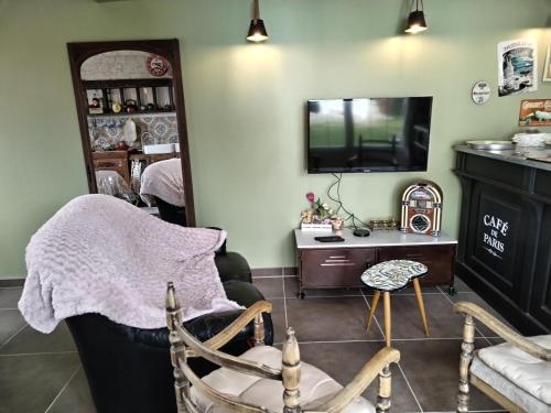 Televisyen dan/atau pusat hiburan di le cottage