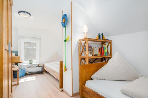 Postel nebo postele na pokoji v ubytování Sandkasten