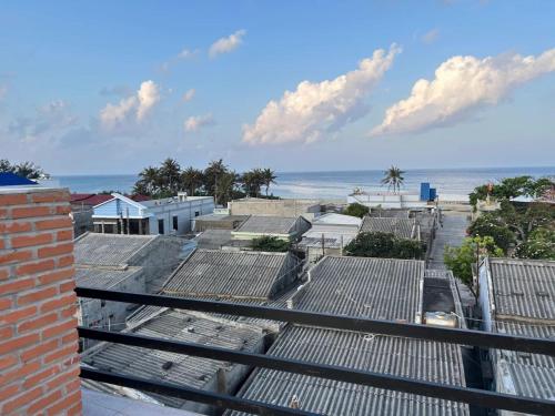 a view of the beach from the roof of a building at Dượng Tài Homestay in Cu Lao Thu