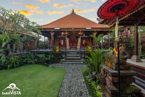 a house with a gazebo in a garden at Taman Prabhawa by Bukit Vista in Sukawati