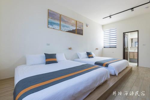 Una cama o camas en una habitación de Jingyan Haiyu