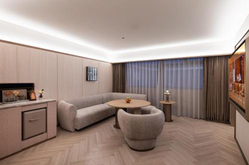 Crystal Orange Hotel Shanghai Zhongshan Parkにあるシーティングエリア