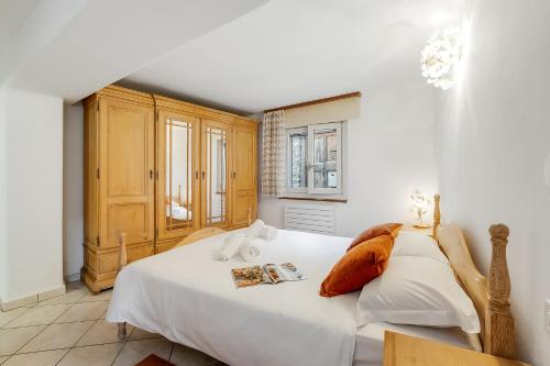 Postel nebo postele na pokoji v ubytování Rustico la Staleta - Happy Rentals