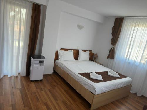 Katil atau katil-katil dalam bilik di Hotel Apollo Central