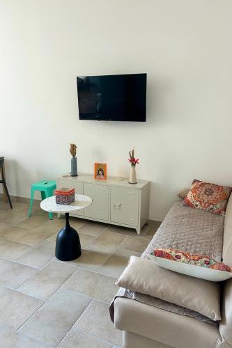TV a/nebo společenská místnost v ubytování Casa Delea