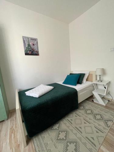 Una cama o camas en una habitación de Happy M&S