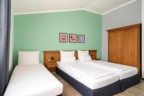 Cama o camas de una habitación en Garner Hotel Munich - Messe by IHG
