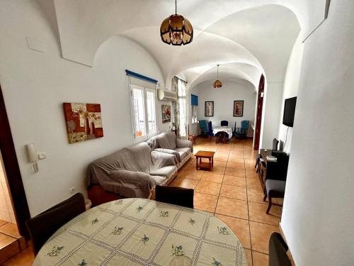 a living room with a couch and a table at "Casa Grande"de Como En Casa in Don Benito