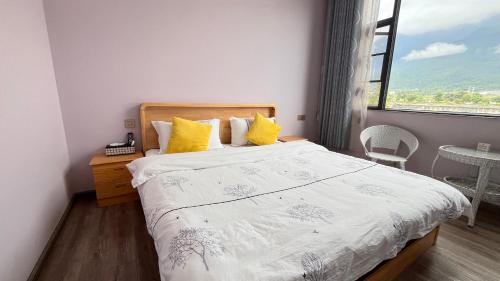 Postel nebo postele na pokoji v ubytování Dali Sifan Homestay