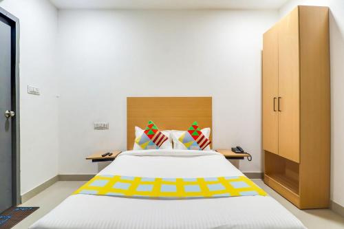 Katil atau katil-katil dalam bilik di Hotel O Basera Homes Jankipuram