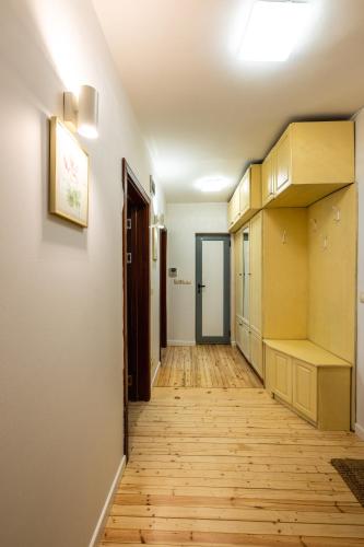 a hallway of a house with wooden floors at Bendida Classic in Velingrad