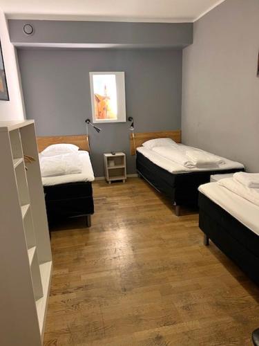 Cama ou camas em um quarto em Mosebacke Hostel
