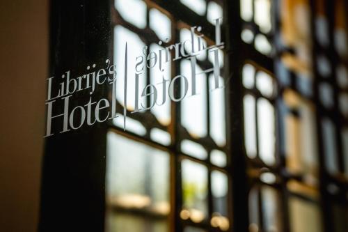 a sign on a window of a hotel at Librije's Hotel in Zwolle