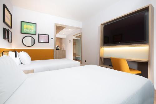 Кровать или кровати в номере Hampton By Hilton Bialystok
