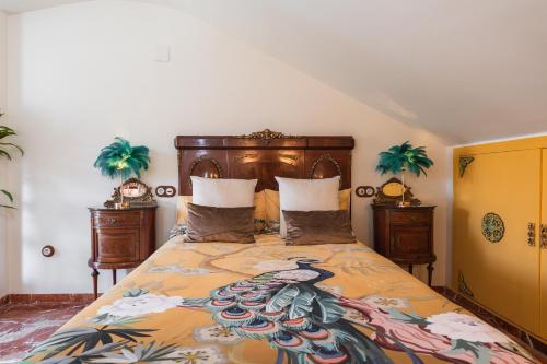 Ένα ή περισσότερα κρεβάτια σε δωμάτιο στο Home4u La Casita de la Luna