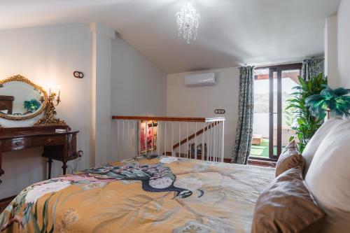 Ένα ή περισσότερα κρεβάτια σε δωμάτιο στο Home4u La Casita de la Luna