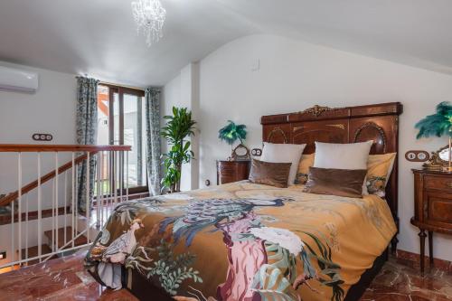 Ένα ή περισσότερα κρεβάτια σε δωμάτιο στο Home4u La Casita de la Luna