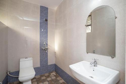 Vannituba majutusasutuses Down Da Village Resort Goa