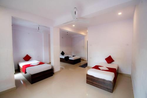 Voodi või voodid majutusasutuse Down Da Village Resort Goa toas