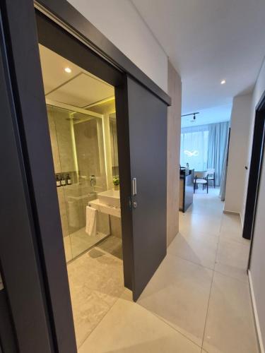 Un baño de Divina Tower Apart Hotel