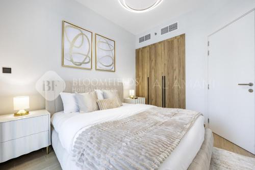 Katil atau katil-katil dalam bilik di Bloomfields Iconic 1Br In Al Maryah Island