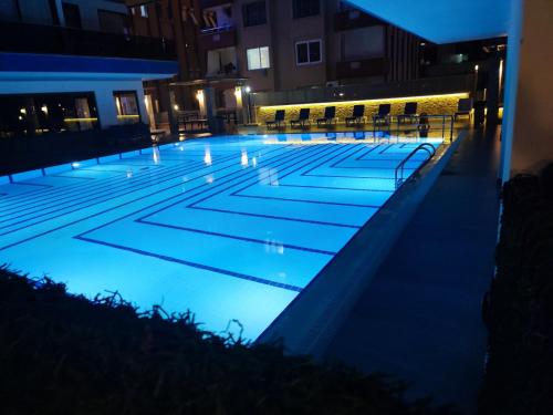 Бассейн в Lovely 2+1 apartment, a few meters from the beach или поблизости