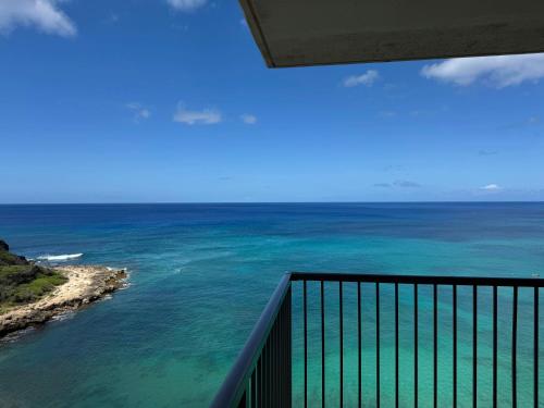 a view of the ocean from a balcony at #Marbella Lane - Beachfront Haven with MT Views! in Waianae