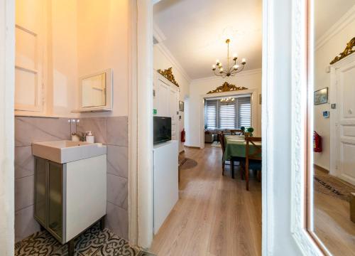 a kitchen and living room with a sink and a table at The Heaven on Heritage Street in Istanbul