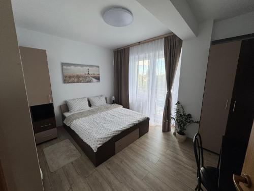 Vuode tai vuoteita majoituspaikassa Vision G2