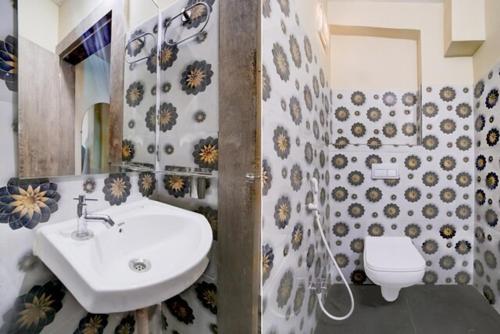 Koupelna v ubytování Hotel Alpine