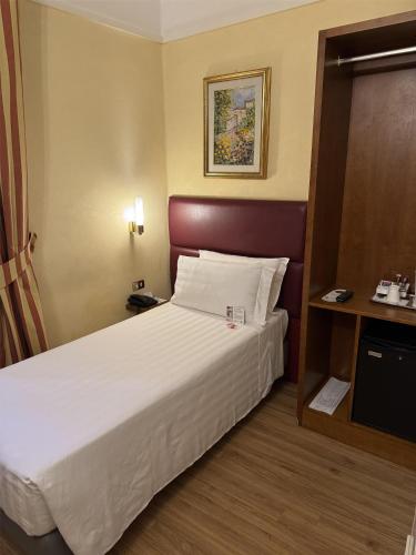Una cama o camas en una habitación de Best Western Hotel Astrid