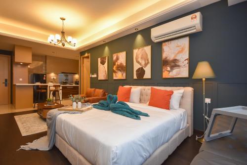 a bedroom with a large white bed in a room at R&F Princess Cove by Nest Home at Johor Bahru in Johor Bahru