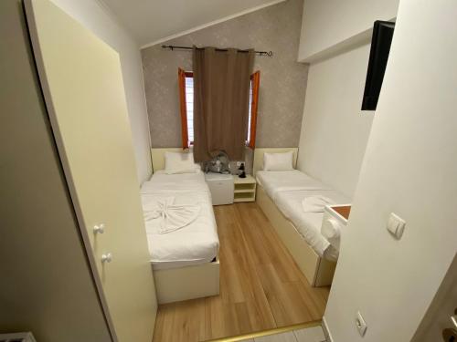 Llit o llits en una habitació de Easy Star Hotel