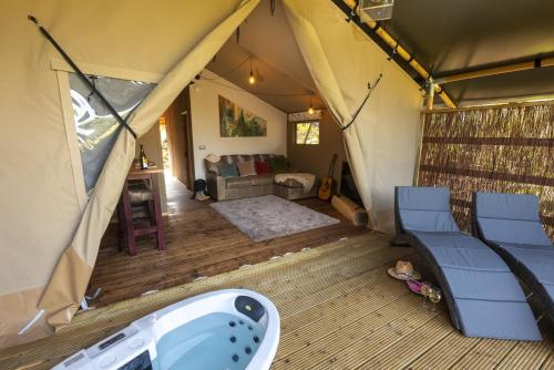 a view of a living room in a tent at Windermere - Safari Suite in Ambleside
