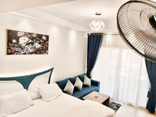 Postel nebo postele na pokoji v ubytování Florenza Khamsin Resort studio N4 and S210