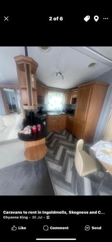 a picture of a kitchen in a boat at Millfields caravan park I9 in Skegness