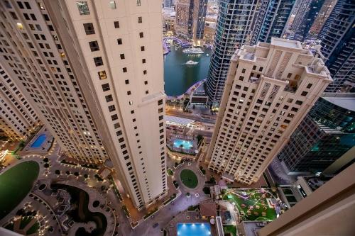 an aerial view of a city with tall buildings at Berloga Holiday Homes JBR in Dubai