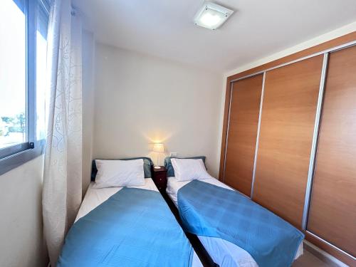 Postel nebo postele na pokoji v ubytování Denia Nature Apartment