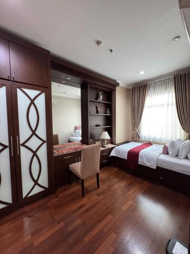 Ένα ή περισσότερα κρεβάτια σε δωμάτιο στο 2 Bedroom apartment at Senayan