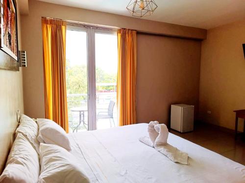 Tahuari Hotelにあるベッド