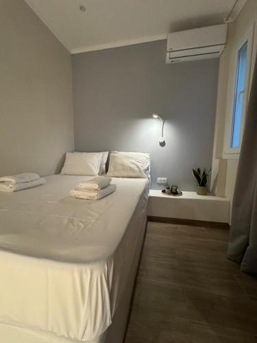 Postel nebo postele na pokoji v ubytování Olivia Tertseti apartment