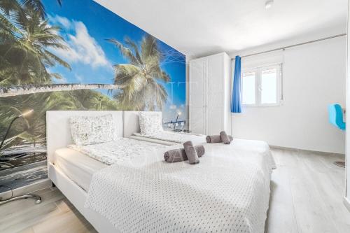 Postel nebo postele na pokoji v ubytování Casa Brisa Del Mar