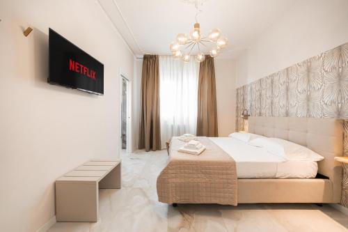 Katil atau katil-katil dalam bilik di Avenue Suites