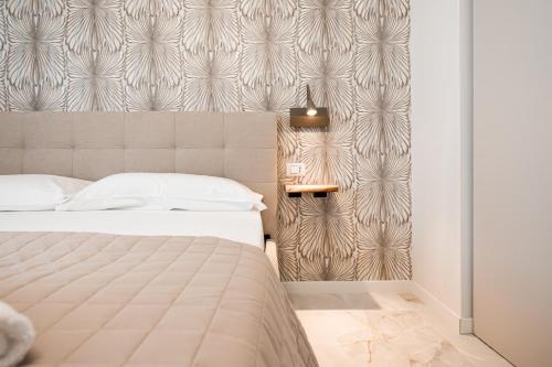 Katil atau katil-katil dalam bilik di Avenue Suites